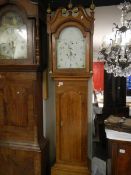 An oak cased 8 day Grandfather clock
 
The name & place on the dial reads Tho Revis Cambridge