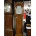An oak cased 8 day Grandfather clock
 
The name & place on the dial reads Tho Revis Cambridge