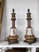 A pair of Grecian style table lamp bases