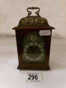 A wood cased carriage clock