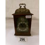 A wood cased carriage clock