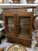 An oak Lapidopterists collector's cabinet
 
Originally a smokers cabinet converted
Drawers move