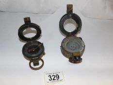 2 brass compasses