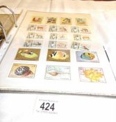 3 folders of stamps including Hong Kong, Gambia, Grenada, Falkland Islands,