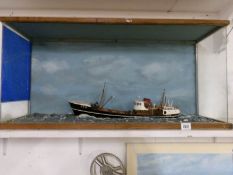 A cased model of a trawler (missing front glass)