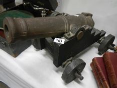 An old cast iron cannon on later carriage
