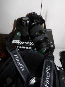 A Fijifilm finepix S3 pro camera,