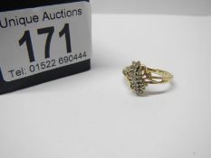 A 14kt gold 30 stone diamond ring, size P