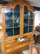 A Dutch marquetry display cabinet
 
It is antique
Approximate height is 94”
Approximate depth is