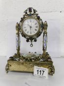 A 1920's silver gilt and enamel clock