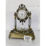 A 1920's silver gilt and enamel clock