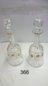 A pair of Val St. Lambert Belgian glass decanters decorated with 24ct gold (signed)