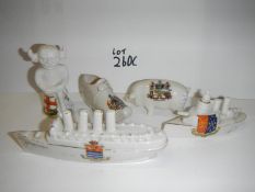 5 items of crested ware including Cunard Liner Lusitania, Lincoln Imp, battleship, shoe and