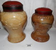 2 19th century stoneware chemist's jars with metal lids