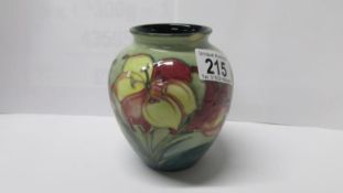 A Moorcroft vase, a/f (chip under rim)