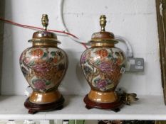 A pair of Oriental style table lamp bases