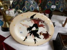 A designer hand painted meat platter depicting witch on broomstick
 
Marked on rear
Dario