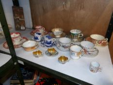 A mixed lot of tea cups and saucers including Victorian, continental, Royal Worcester etc