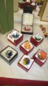 7 boxed glass paperweights including Caithness