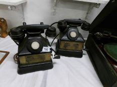 A pair of hand wound telephones dated june '48 by ATM and certified by the Ministry of fuel and