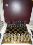 A brass and bronze chess set