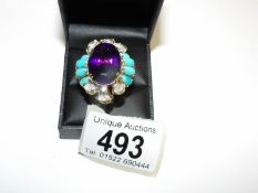 An 18ct gold large oval diamond and amethyst ring set with turquoise, circa 1970/80's, size N