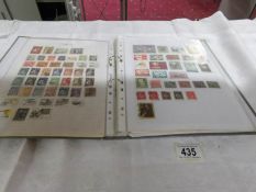 5 folders of world stamps, used and unused, Pitcairn Islands, Rhodesia,