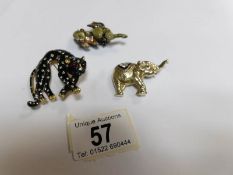 2 elephant brooches and a jaguar brooch