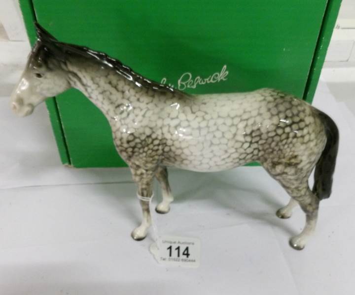 A boxed Beswick rocking horse grey
 
This is in good condition with no damage or restoration marks