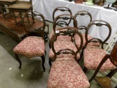 A set of 6 walnut cabriole leg dining chairs