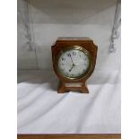 A small presentation clock dated 1915