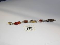 An unmarked Scottish silver and agate bracelet