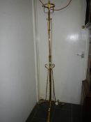 A Victorian brass standard lamp