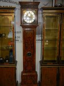 A brass faced marquetry inlaid Grandfather clock
 
Condition as per picture
Weights are brass