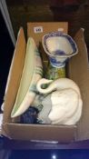 A box of miscellaneous china items