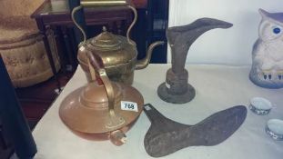 A copper kettle, brass kettle and 3 shoe lasts