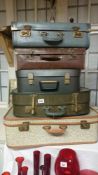 5 vintage suitcases