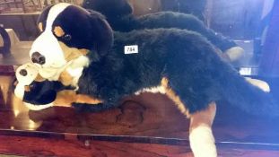 A Border Collie soft toy with puppy