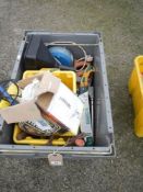 A large box of tools including saws