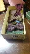 A box of vintage bow ties