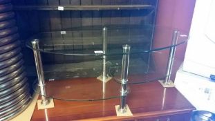 A chrome and glass coffee table
