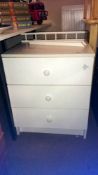 A white 3 drawer chest