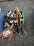 A large box of tools including planes