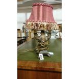 An unusual table lamp inset with gems