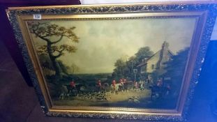 A gilt framed hunting scene on canvas