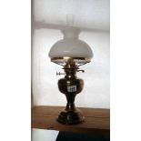 A brass oil lamp