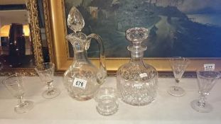 2 decanter and a quantity of glasses