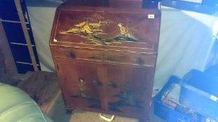 A bureau with Oriental design on