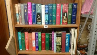 2 shelves of antique reference books