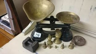 A set of brass scales and weights